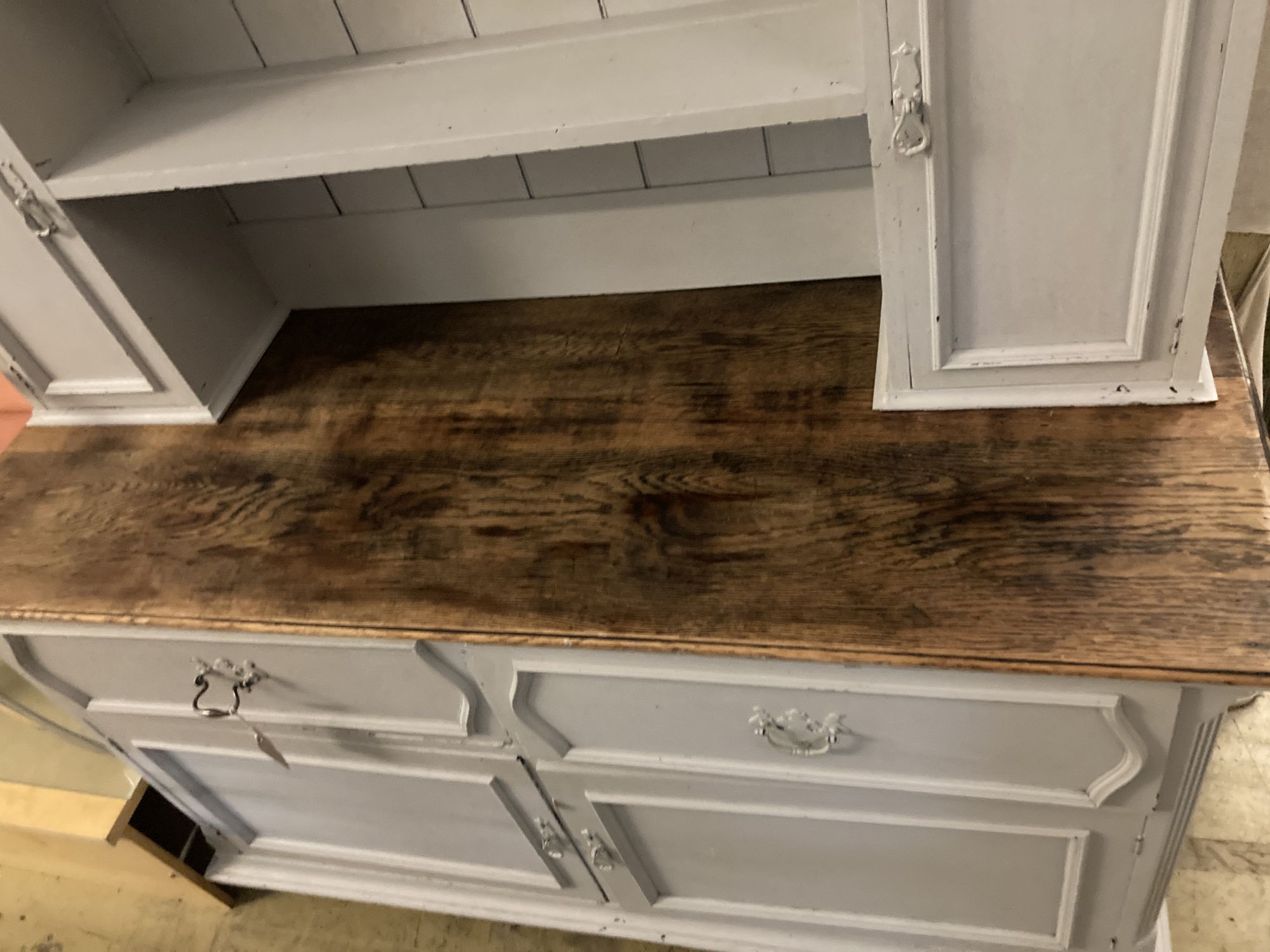 An early 20th century painted oak dresser, width 152cm depth 56cm height 197cm